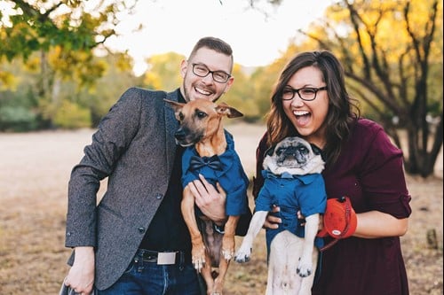 J and his wife Brittany with their two dogs